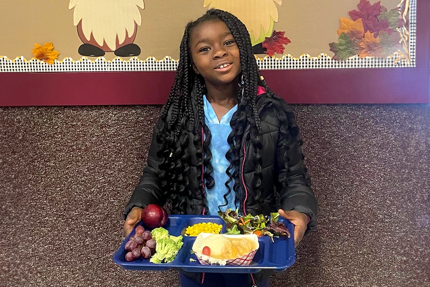 student with school meal