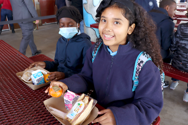 student with school meal