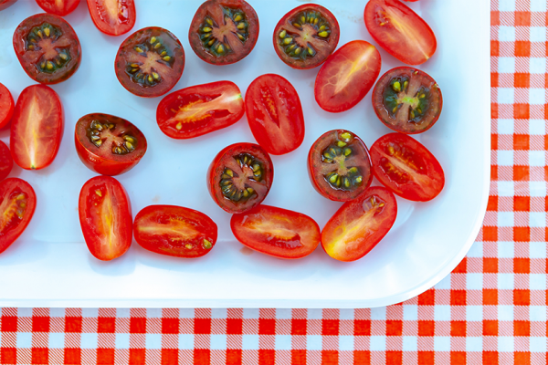 cherry tomatoes cut in half on plate
