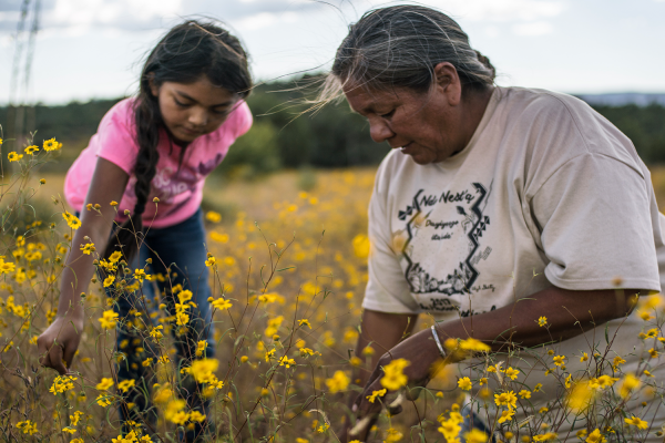 woman and girl in field