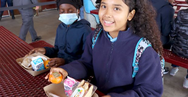 student with school meal