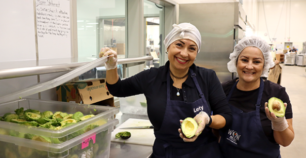 Staff prepare avocados for guacamole